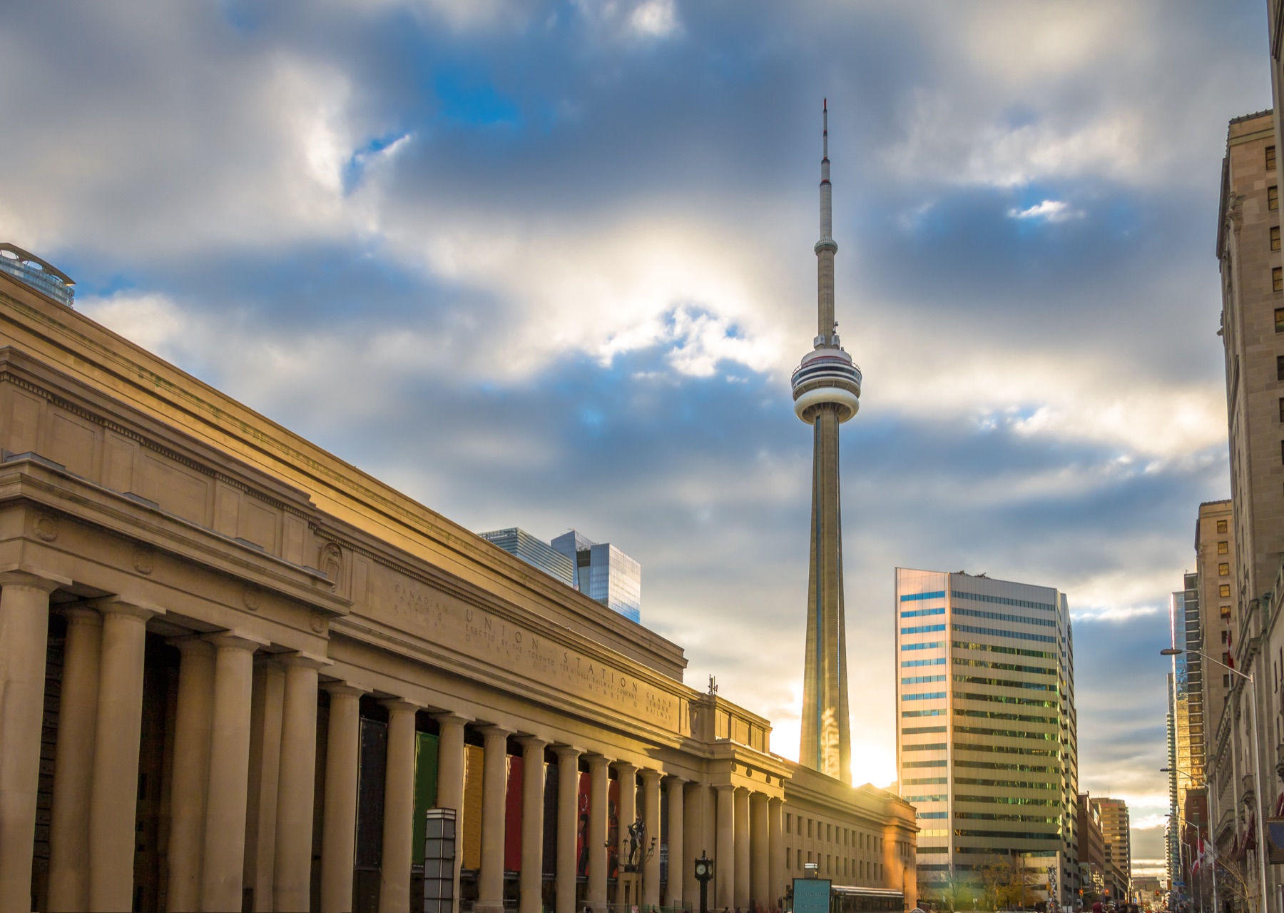 Toronto's Union Station and the CN Tower at sunset