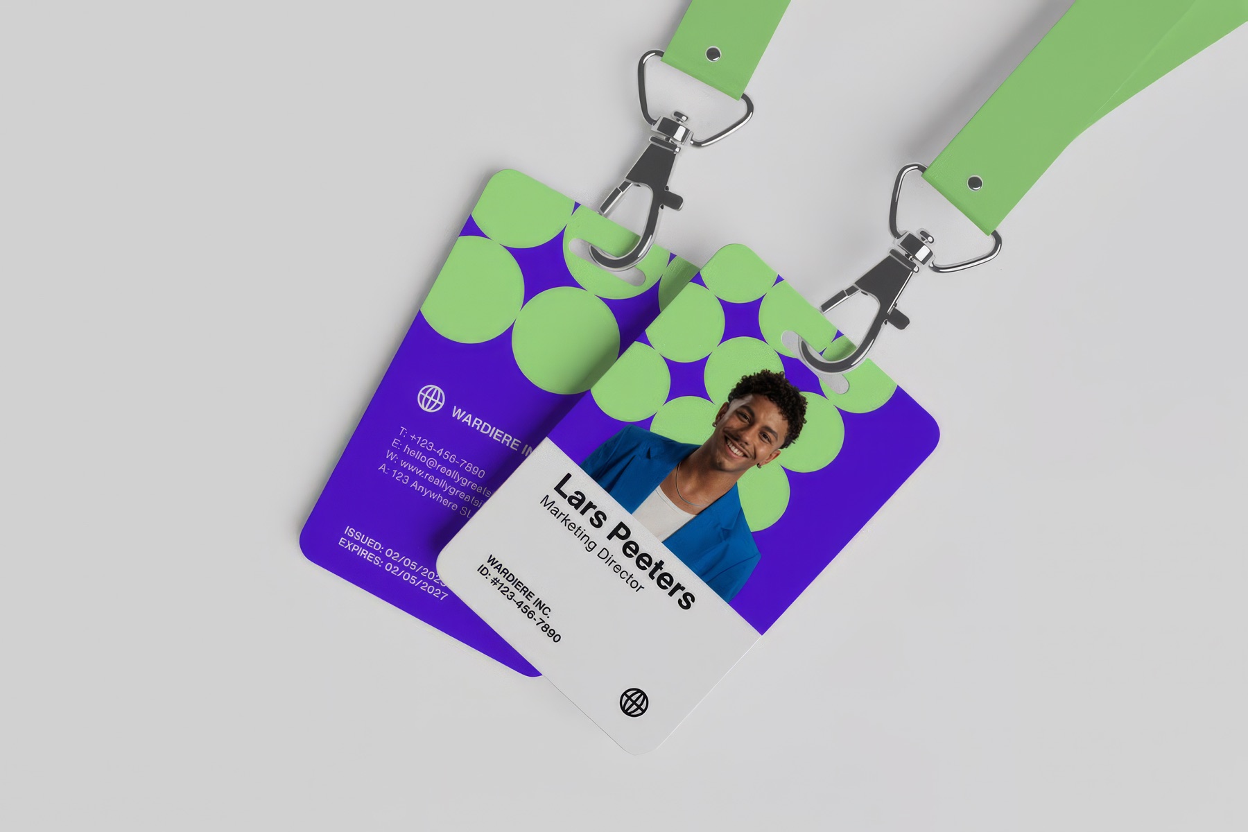 Two branded ID badges on lanyards, showing a company logo side and a staff photo side